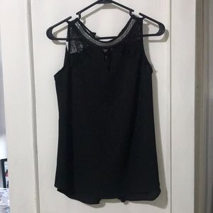 Maurice’s black tank top